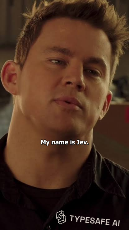 A still from 22 Jump Street, captioned "My name is Jev." The shirt has a TypeSafe AI logo on the chest.